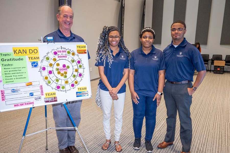 2022 first place group with board