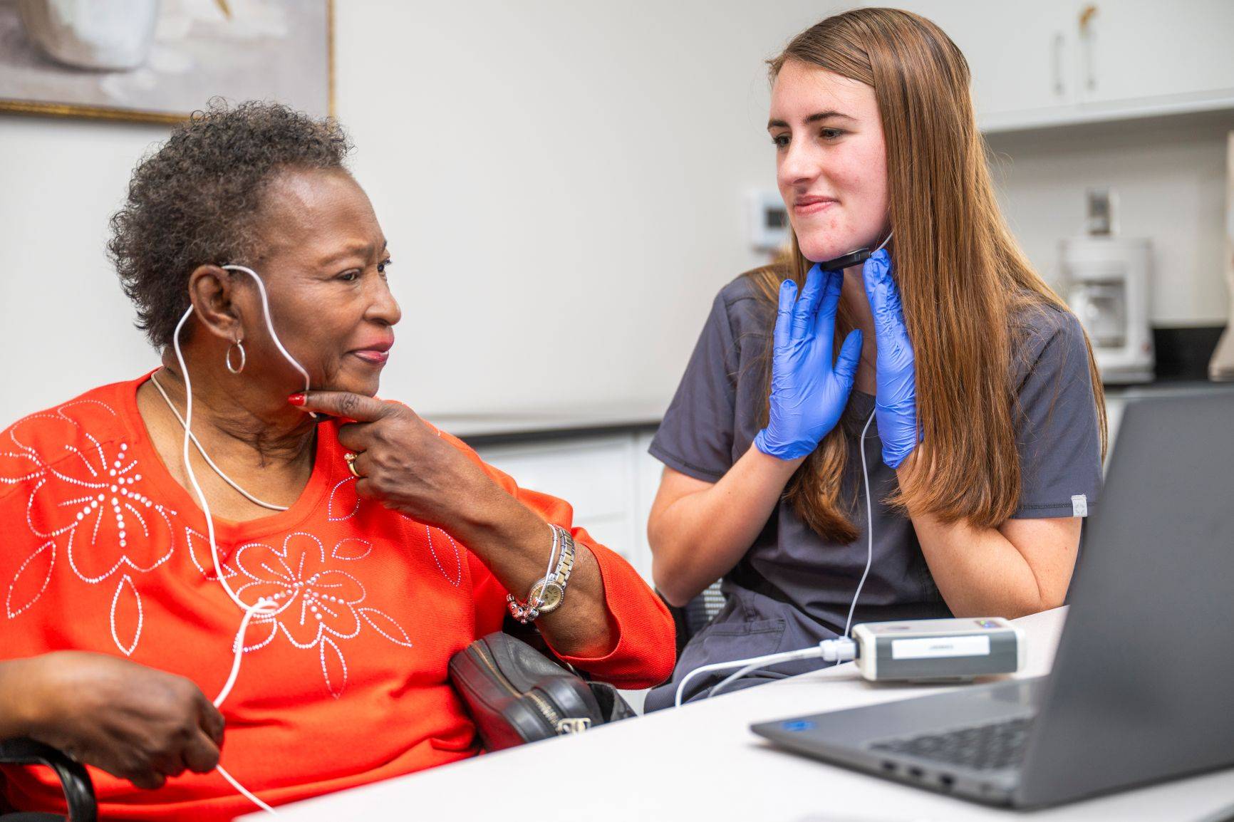SLP student with patient