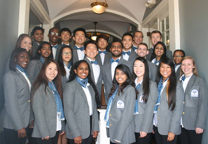Group photo of student alumni ambassadors in gray suit jackets and white shirts 