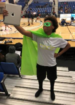 student dressed up as a superhero 