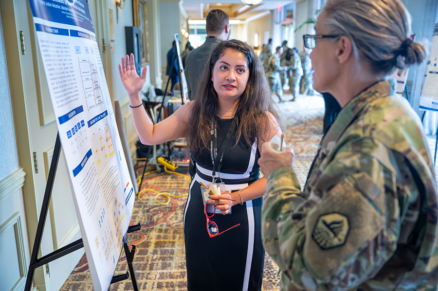 PhD student presenting research.