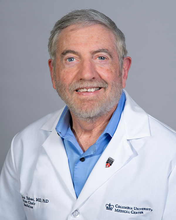 A male scientist wearing a lab coat