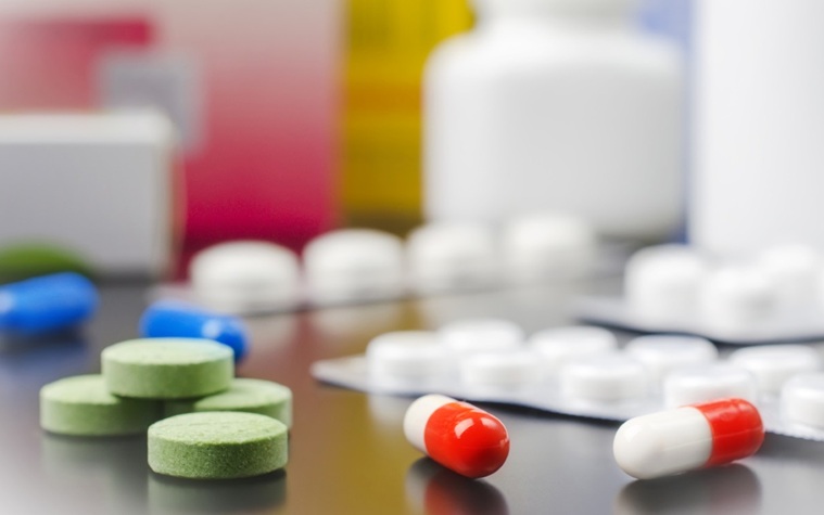 prescription drugs laying on a table