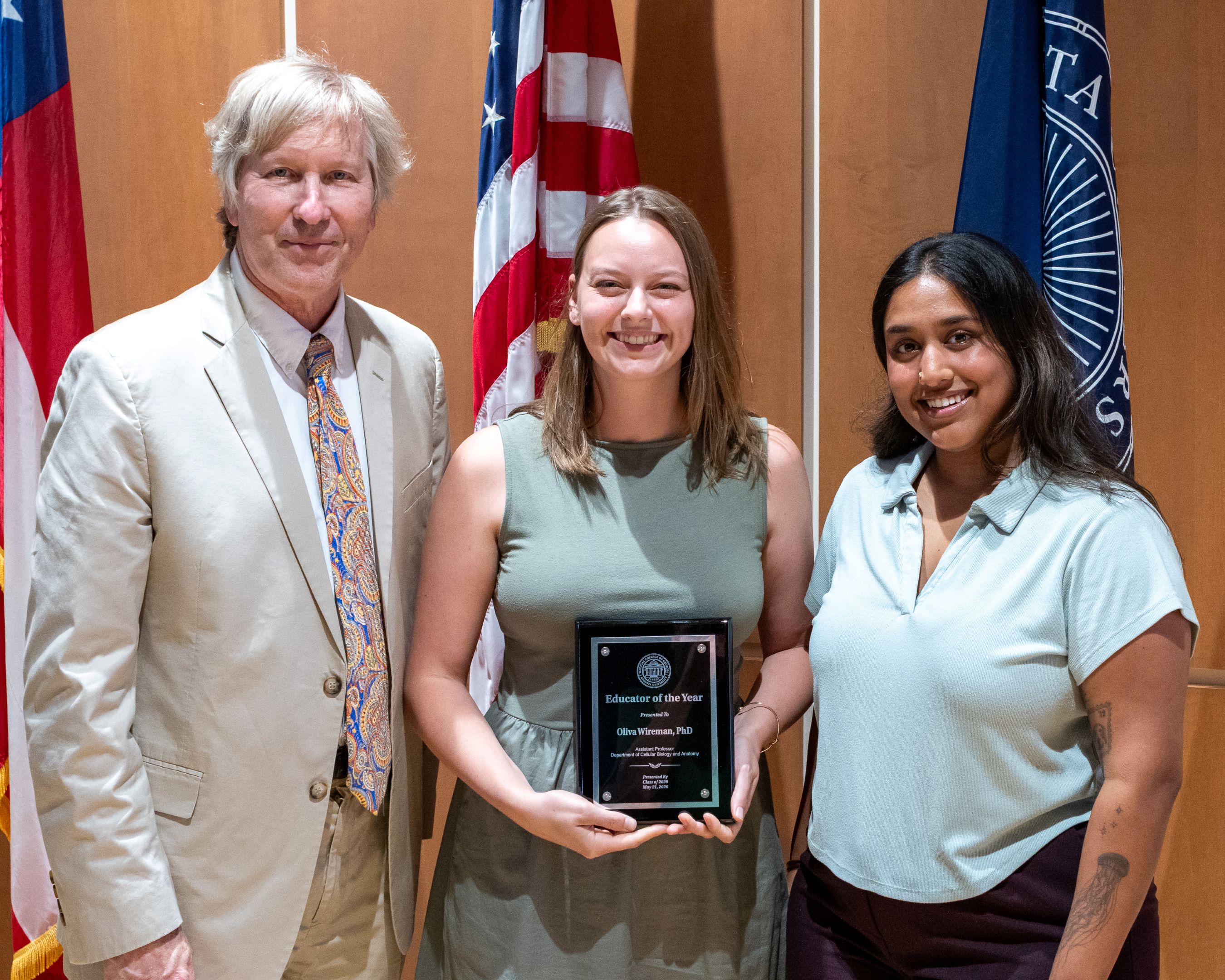 Dr Wireman standing with her award