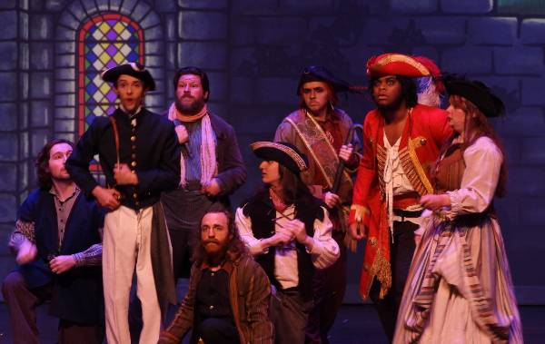 Performance on Stage Performance on stage with characters at tables