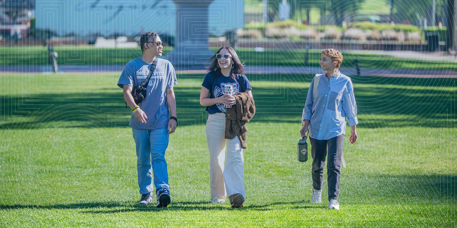 Three AU community members walking outside