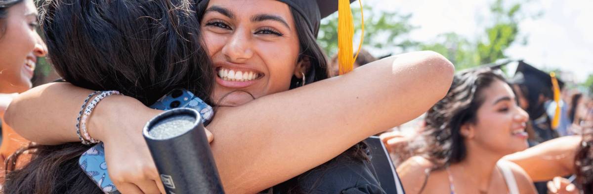 grateful graduate hugs