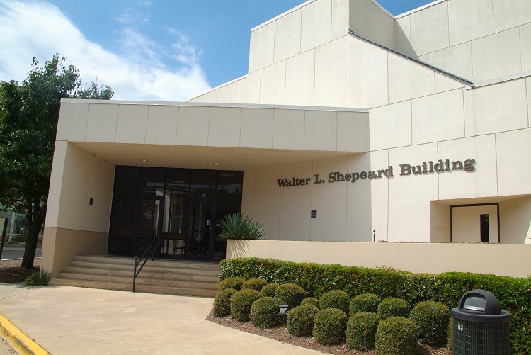 building with "Walter L. Shepeard Building" on side