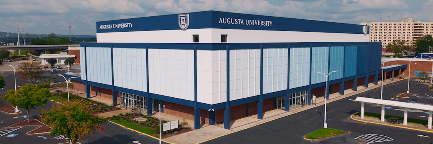 Group of three AU employees at the Service Recognition event