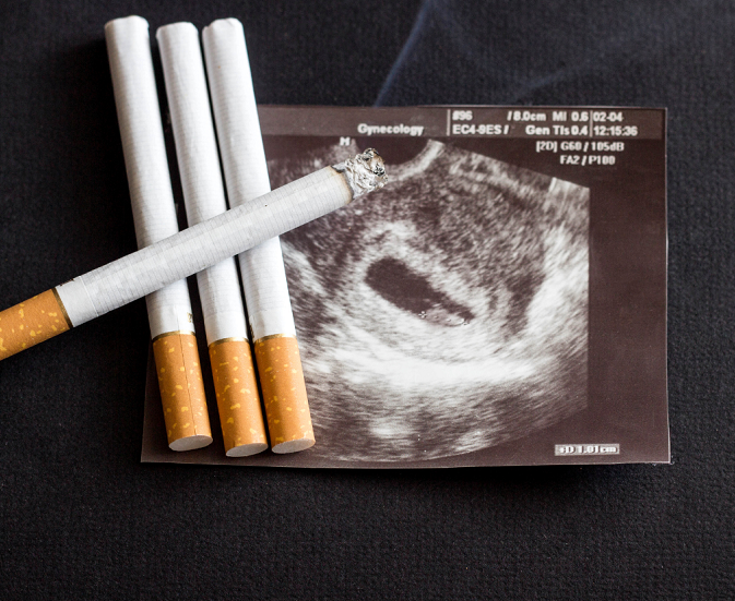 cigarettes sitting next to an ultrasound