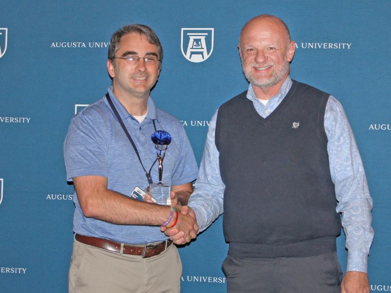 Jason Rote being presented and award by Michael Casdorph