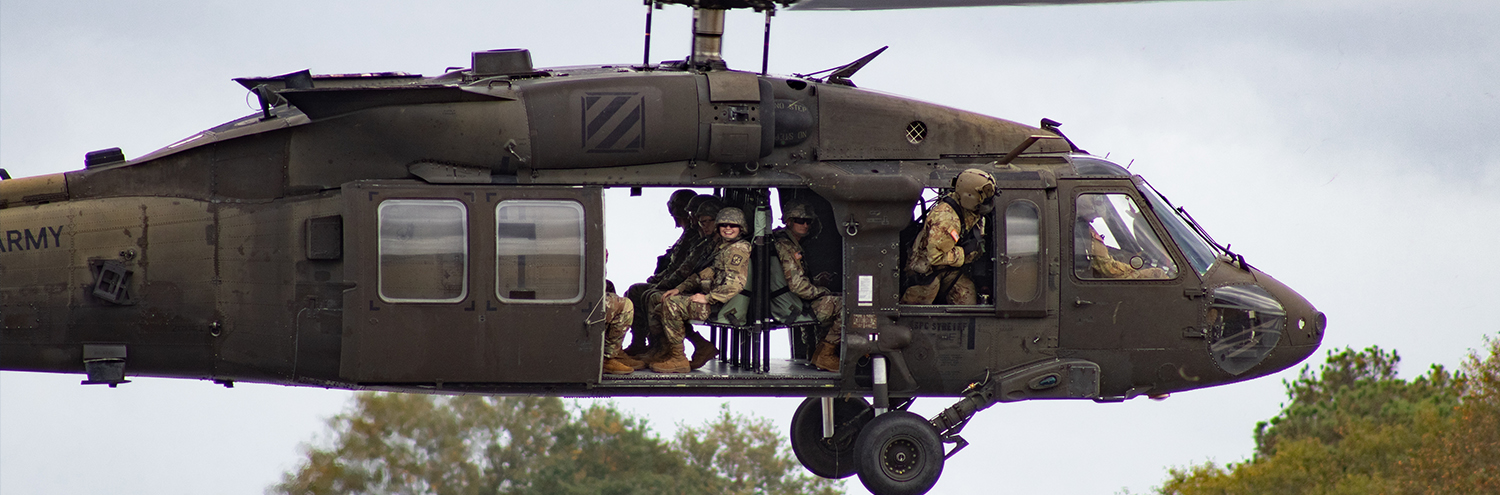 Cadets flying in an Army helicopter