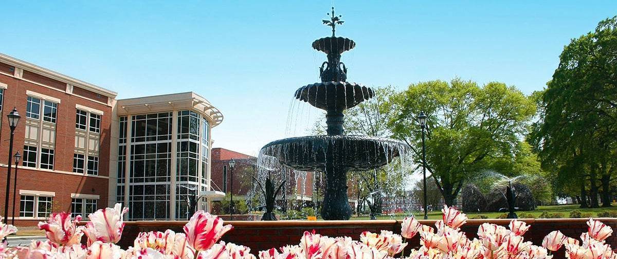 Summerville Campus fountain in spring