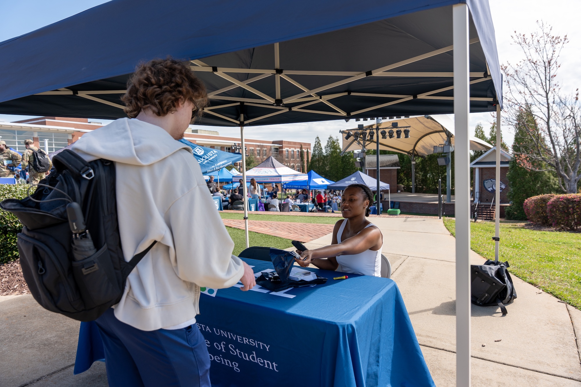 student checking in at Health and Wellness Fair