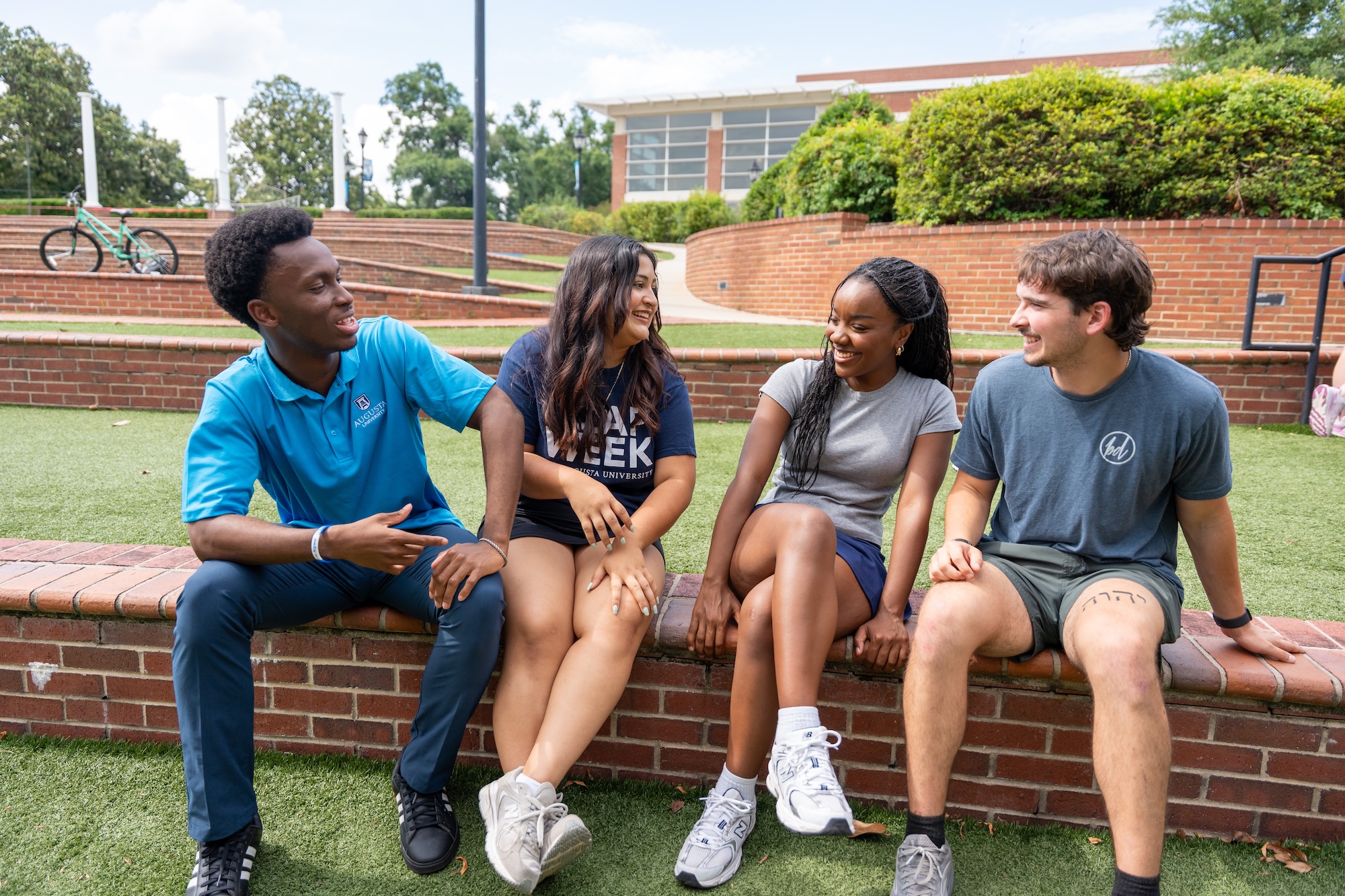 students laughing at amphitheatre