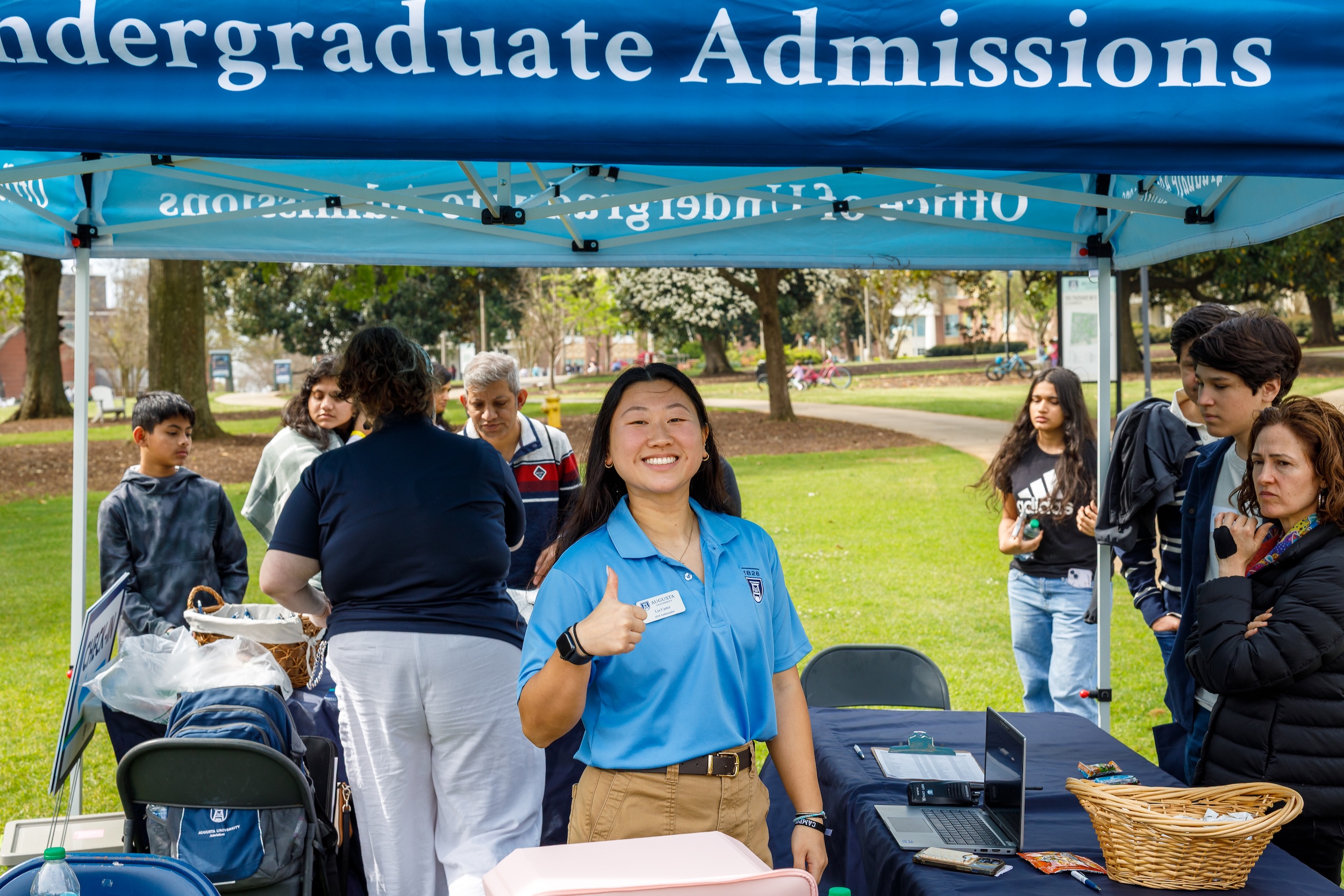 thumbs up at See Augusta check-in table