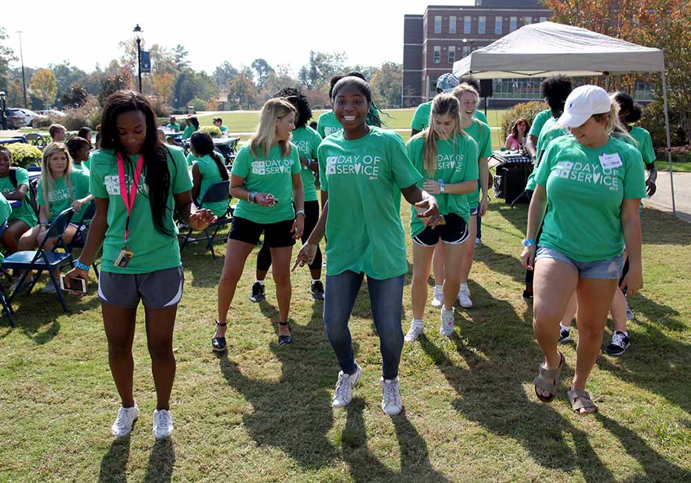 Group of students dancing at day of service