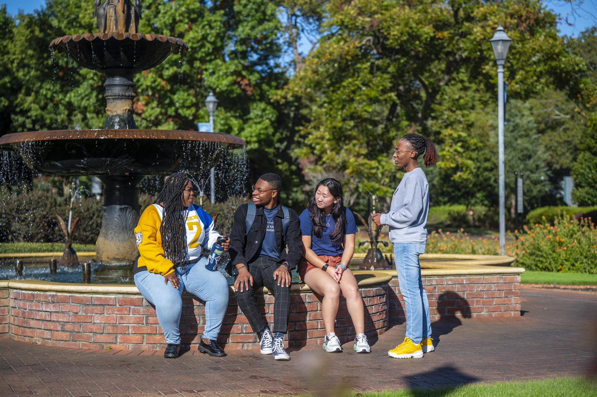 Students Sitting on Summerville Fountain