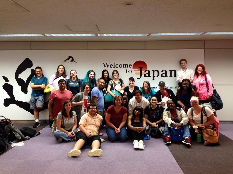 students posing in a room