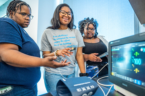 Students using medical devices